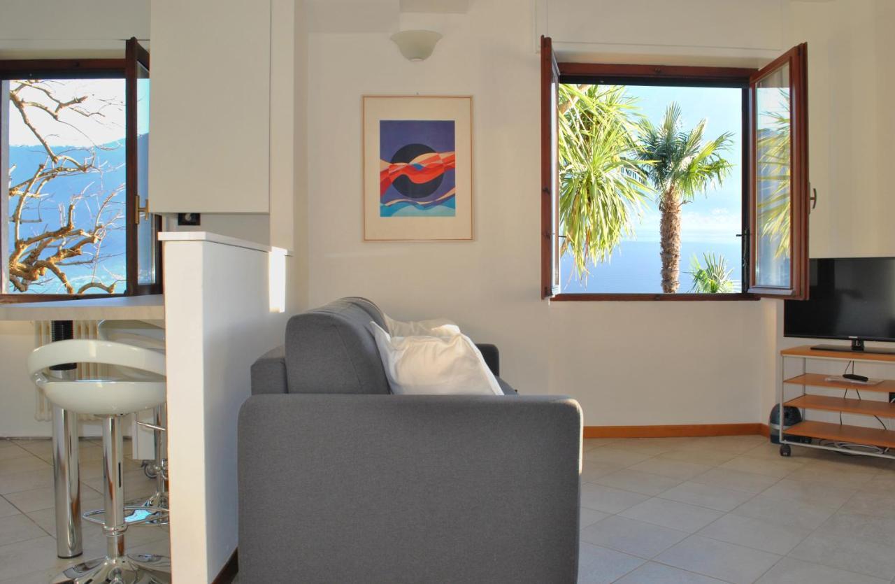 Apartment The Palm With Garden Sala Comacina Esterno foto