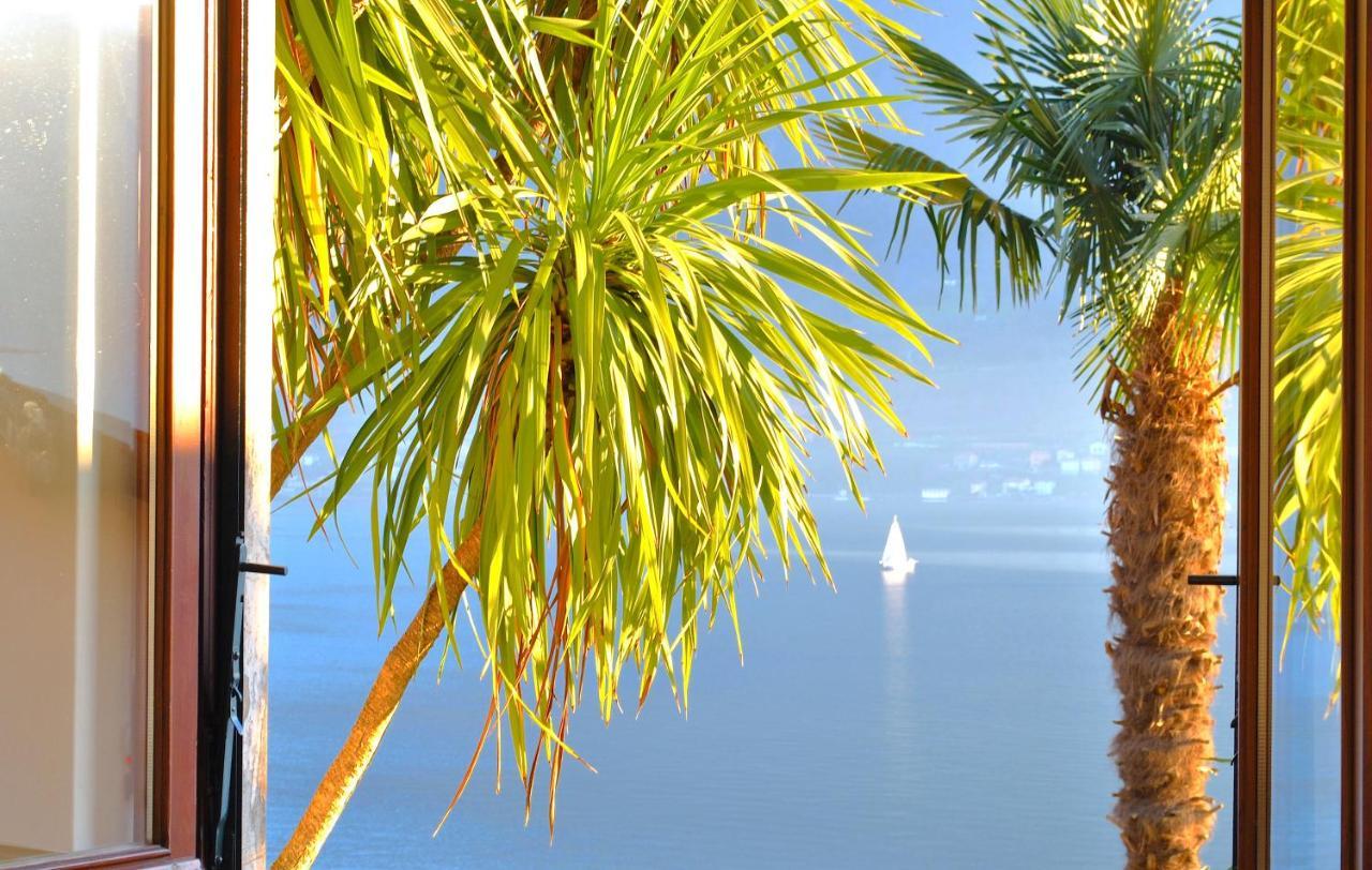 Apartment The Palm With Garden Sala Comacina Esterno foto