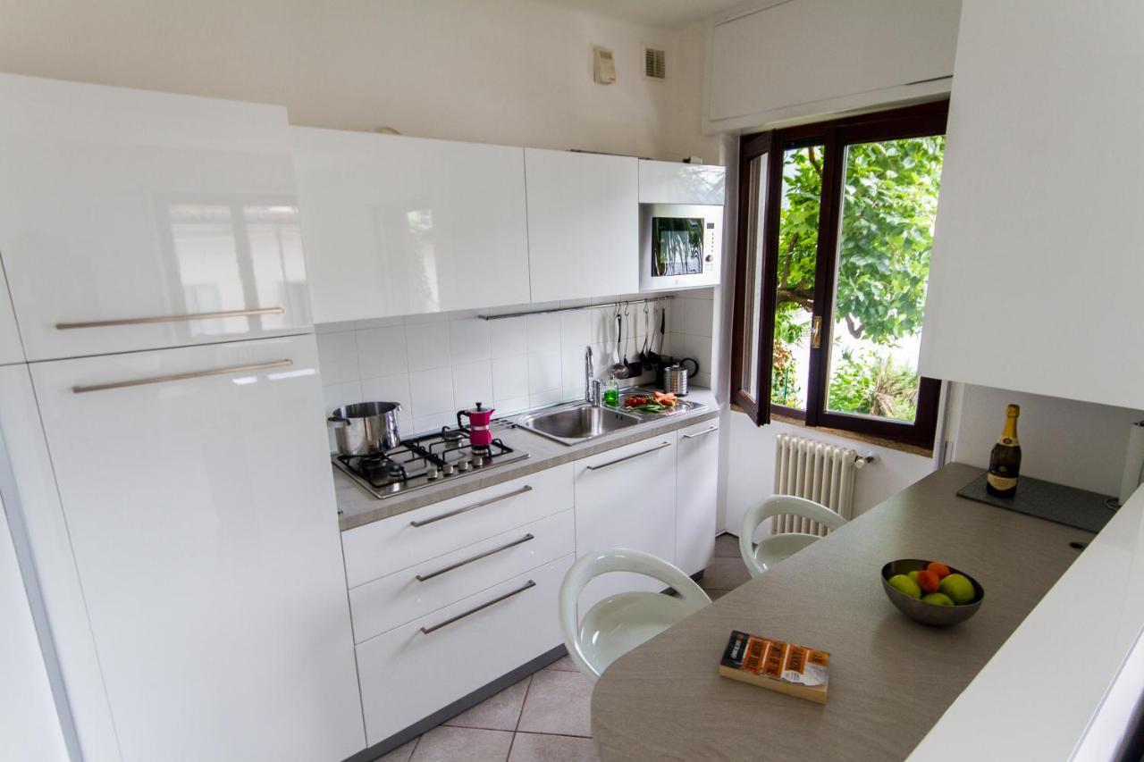 Apartment The Palm With Garden Sala Comacina Esterno foto